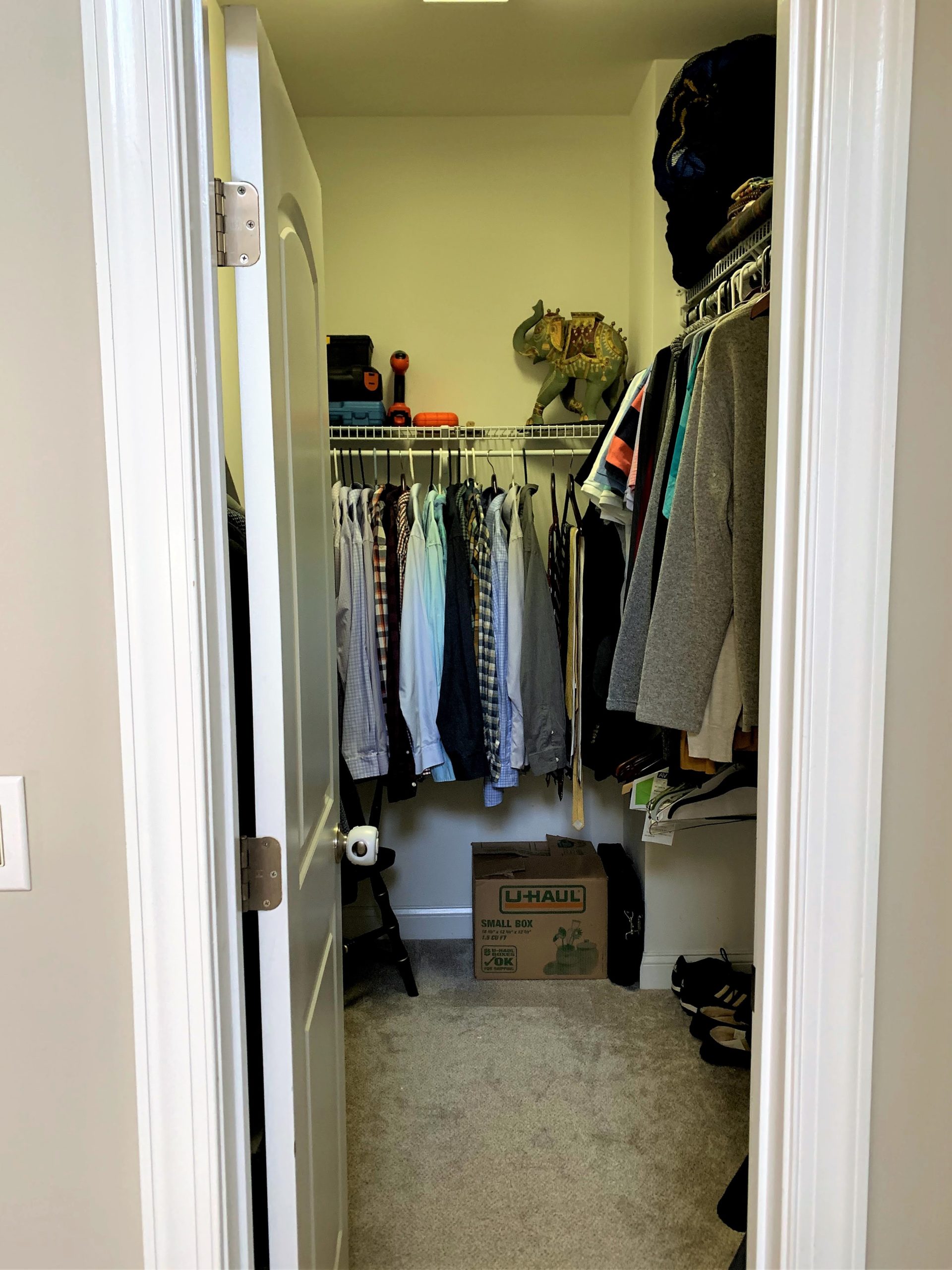 Primary Men's Closet Organized